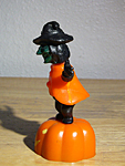 green witch side view