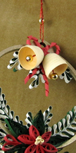 quilled hoop ornament with bells close-up