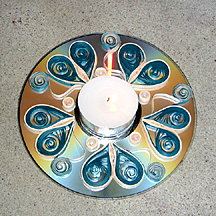 Quilled candle holder on a CD