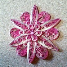 quilled gilded flower brooch