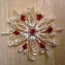quilled snowflake in red and white