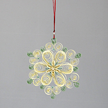 green and cream quilled snowflake