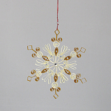 gold and cream quilled snowflake