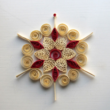 ecru and red quilled snowflake