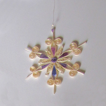 cream and lavander quilled snowflake
