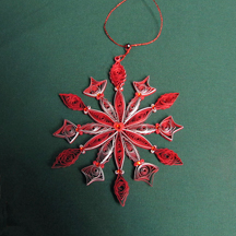 quilled gilded red snowflake